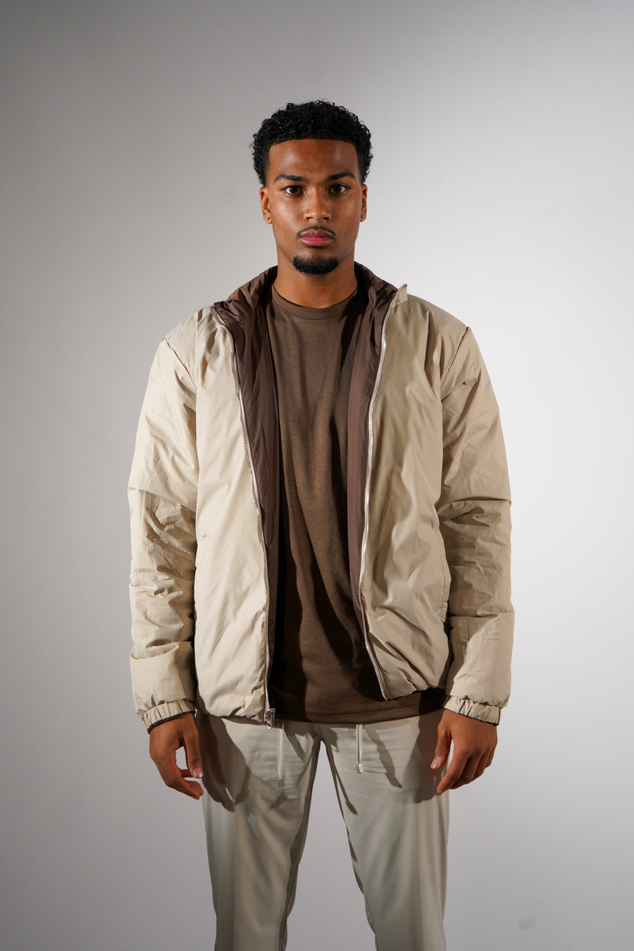 Bruine/beige dubbelzijdig puffer jas