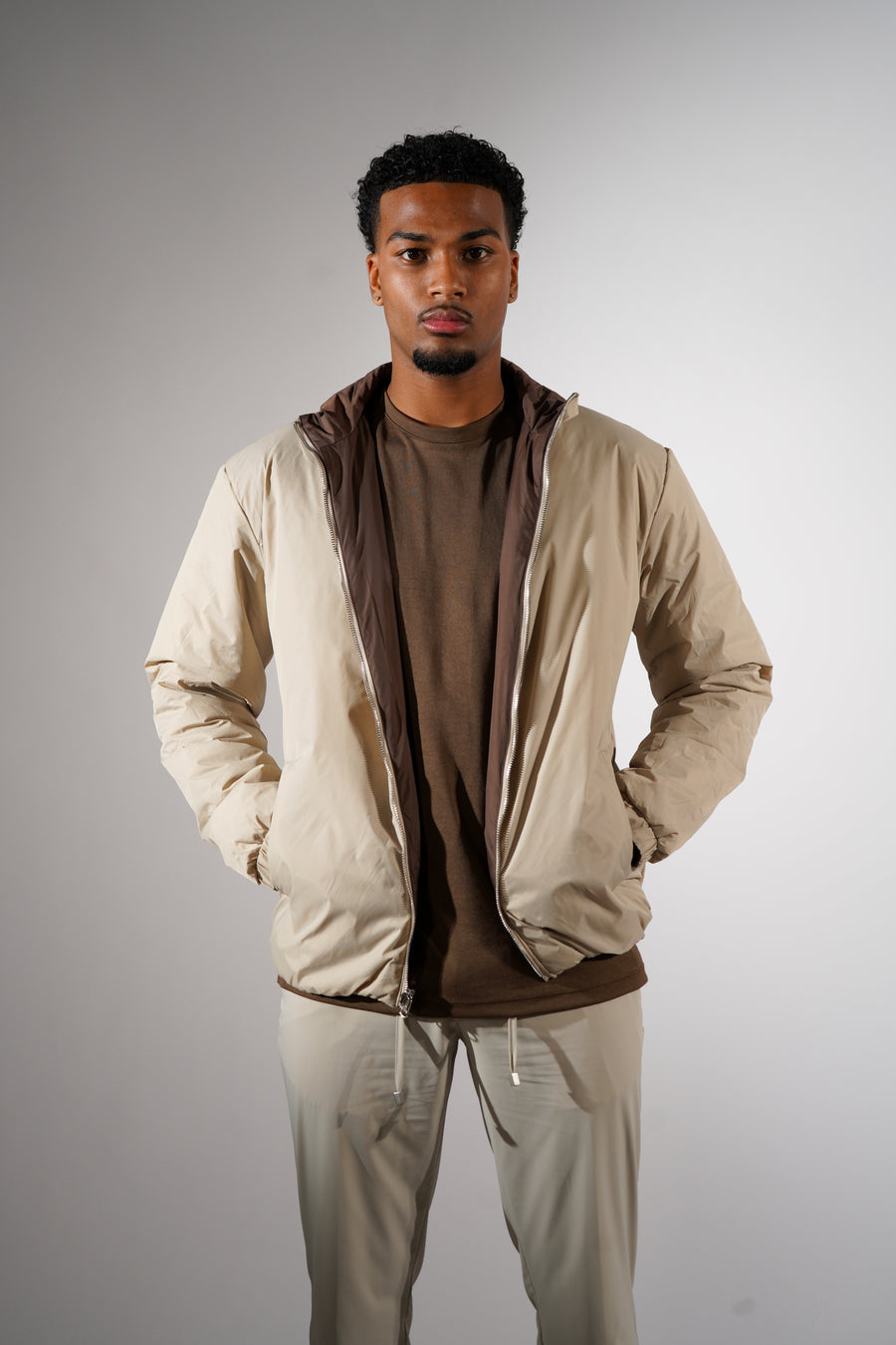 Bruine/beige dubbelzijdig puffer jas