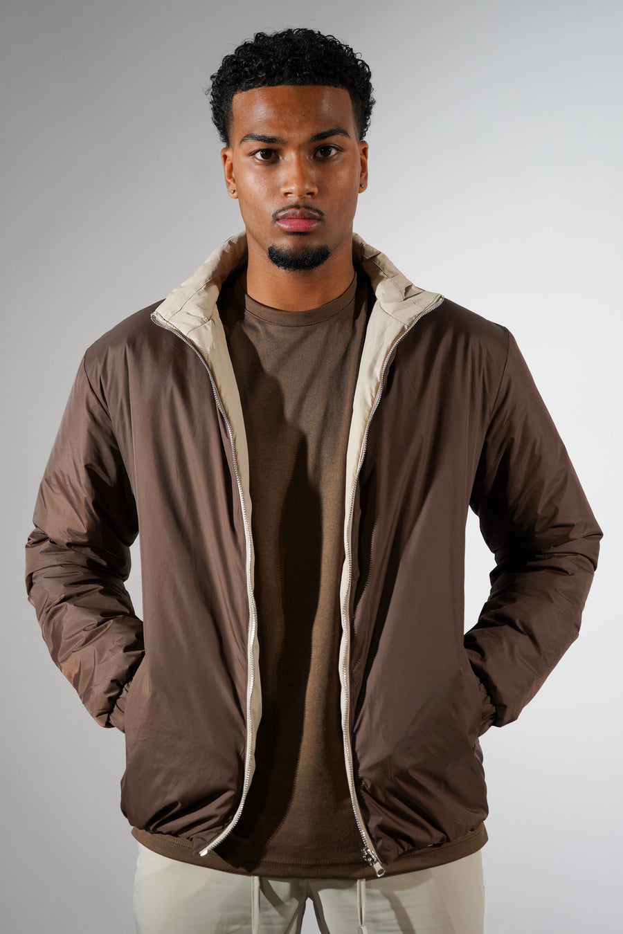 Bruine/beige dubbelzijdig puffer jas